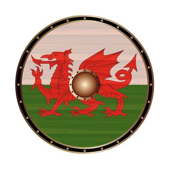 A Viking style round shield with the Welsh red dragon flag color design isolated on a white background
