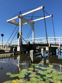 Bridge over a canal in IJlst Friesland The Netherlands