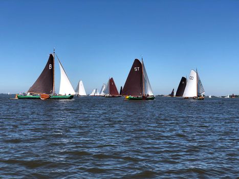 Sailing on a lake in Friesland The Netherlands