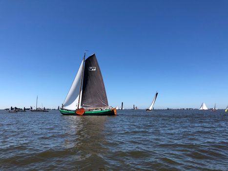 Sailing on a lake in Friesland The Netherlands