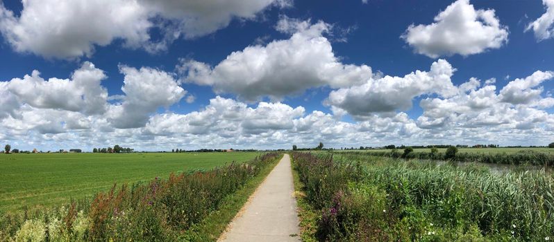 Panorama from a walk and cycle path in Friesland The Netherlands