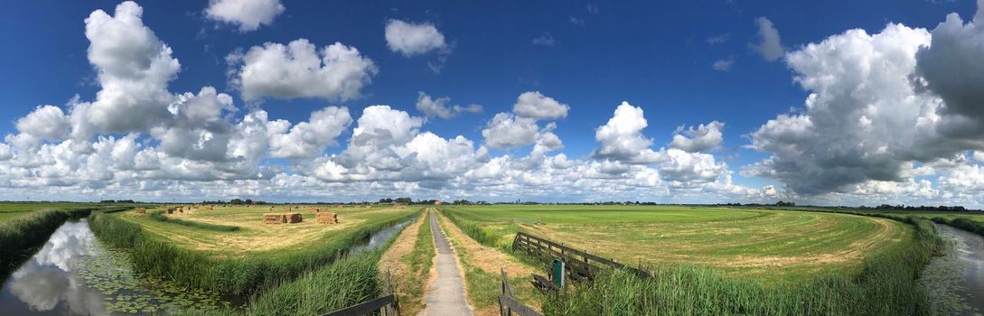 Panorama from a walk and cycle path in Friesland The Netherlands