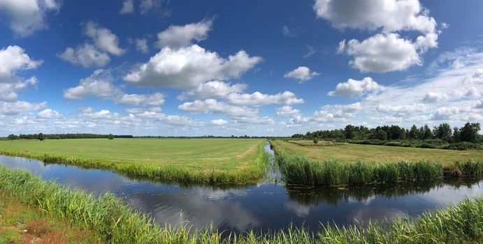 Panorama from farmland around Earnewâld in Friesland The Netherlands