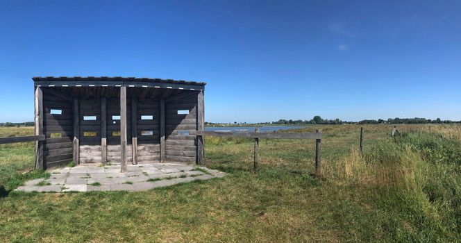 Bird watch hut at zwagermieden nature reserve in Friesland The Netherlands