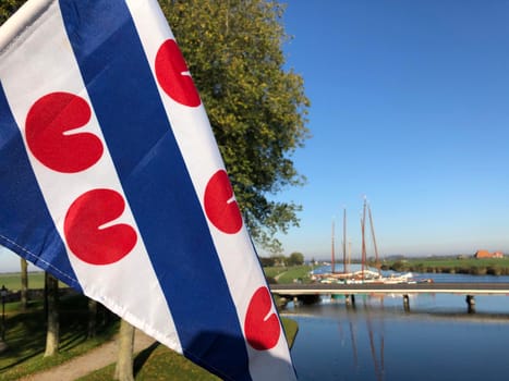 Frisian flag during autumn in Sloten, Friesland, The Netherlands