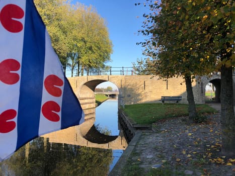 Frisian flag during autumn in Sloten, Friesland, The Netherlands