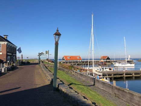 Harbor in Hindeloopen during autumn in Friesland, The Netherlands