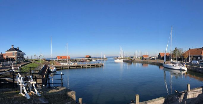 Panorama from the harbor in Hindeloopen during autumn in Friesland, The Netherlands