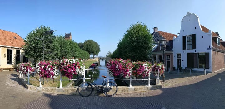 Panorama a bridge over a canal in Sloten, Friesland The Netherlands