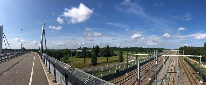 Panorama from a bridge over a train track in Zevenaar in The Netherlands