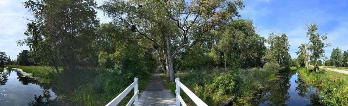 Panorama from a bridge over a canal around Kalenberg in Overijssel, The Netherlands