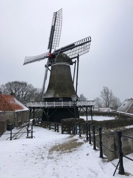 Windmill in Sloten during winter