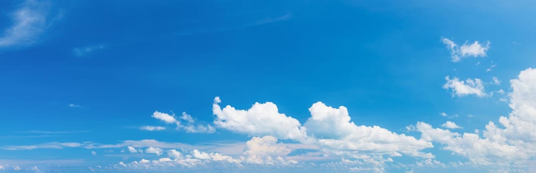 Soft white clouds against blue sky ,Panoramic fluffy clouds in the blue sky