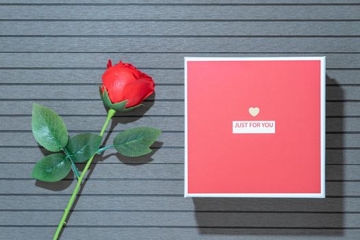 Top view  Valentine's Day concept with red roses and red box