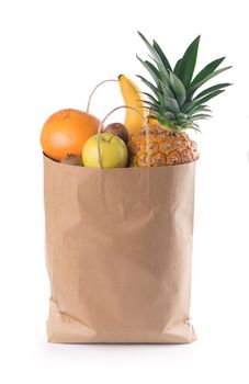 Fruits and vegetables in paper grocery bag isolated over white background