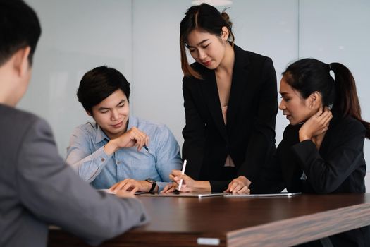 Startup Diversity Teamwork Brainstorming Meeting Concept.Business Team Young Asian People Coworkers.