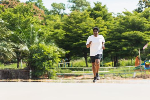 Asian young lifestyle athlete sport runner black man wear feet shoe active running training at the outdoor on the treadmill line road, healthy exercise workout