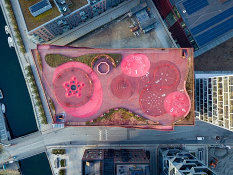 Copenhagen, Denmark - April 07, 2020: Aerial drone view of Konditaget Luders, a recreational space on top of a multi-storey car park.