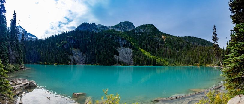 Majestic mountain lake in Canada. Upper Joffre Lake Trail View, Joffre Lakes Provincial Park - Middle Lake. British Colombia Canada