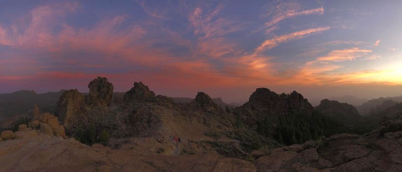 Sunset and pink sky panorama of Roque Nublo the volcanic rock on the island of Gran Canaria