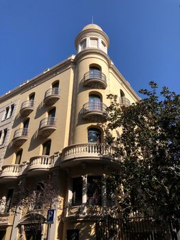 Building at the corner of Carrer del Torrent de l'Olla in Barcelona, Spain