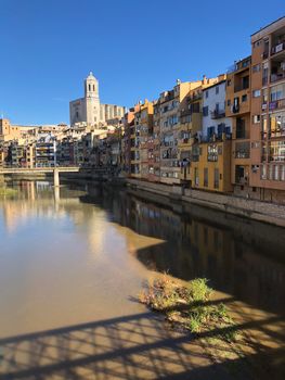 The Onyar river and the Girona Cathedral in Girona, Spain