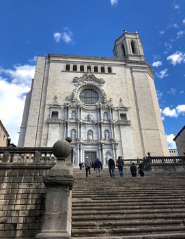 People walking at the stairs from the Cathedral of Girona in Catalonia, Spain