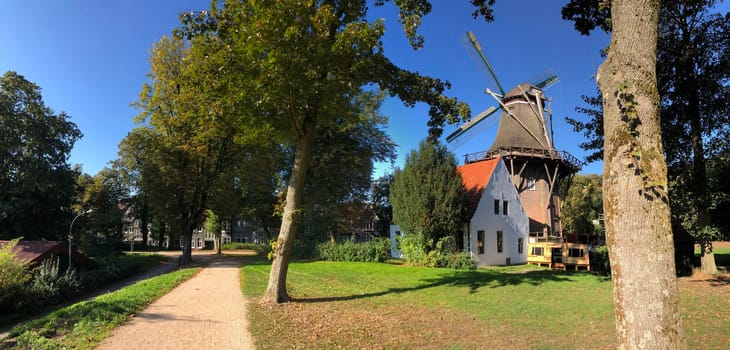 Panorama from the city park with windmill in Emden, Germany