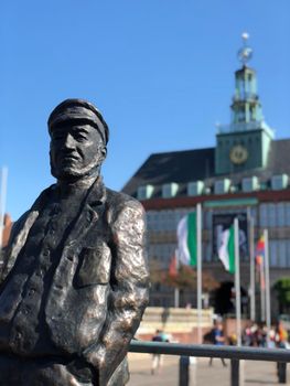 Statue of the Emder Delftspucker in Emden Germany