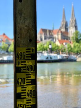 A meter to measure the water level on the Danube river in Regensburg, Germany