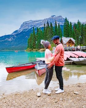 Emerald Lake, Yoho National Park in Canada, Emerald Lake and Tea House, Near Field, British Columbia, Yoho National Park, Canada Mount Burgess can be seen reflected into the water. couple kayak lake