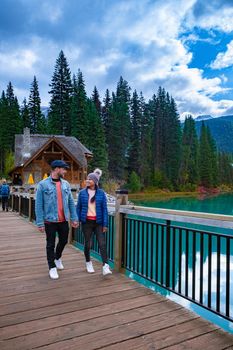 Emerald Lake, Yoho National Park in Canada, Emerald Lake and Tea House, Near Field, British Columbia, Yoho National Park, Canada Mount Burgess can be seen reflected into the water. couple kayak lake