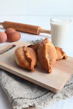 homemade small pies with apples in Russian style