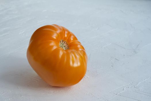 sweet orange cherry tomato on white background.