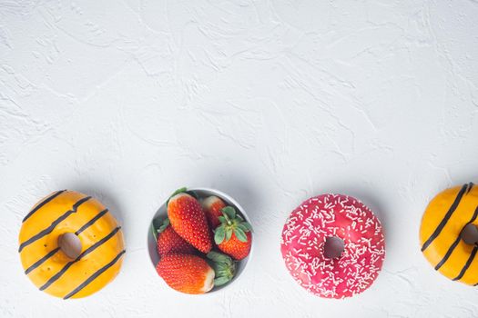 Glazed donuts set, on white background, top view flat lay with copy space for text
