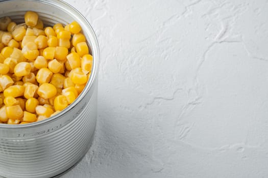 Canned sweet corn in can, on white background with copy space for text