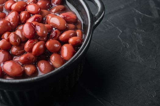 Azuki red beans, on black background with copy space for text