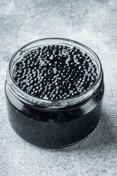 Black Caviar jar, on gray background