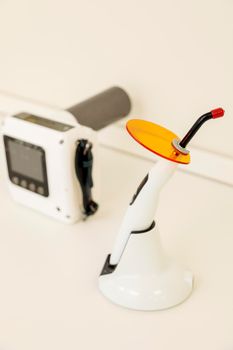 Interior of the dental office with a chair and tools for dental treatment.