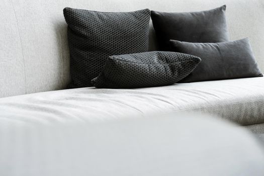 Detail image of cushion on sofa, modern living room.