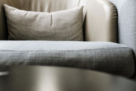 Detail image of cushion on sofa, modern living room.