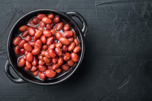 Japanese canned food ingredient, sweet red beans, on black background, top view flat lay with copy space for text