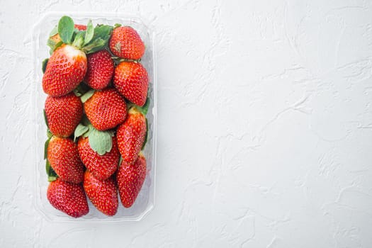 Fresh, red strawberry, on white background, top view flat lay with copy space for text