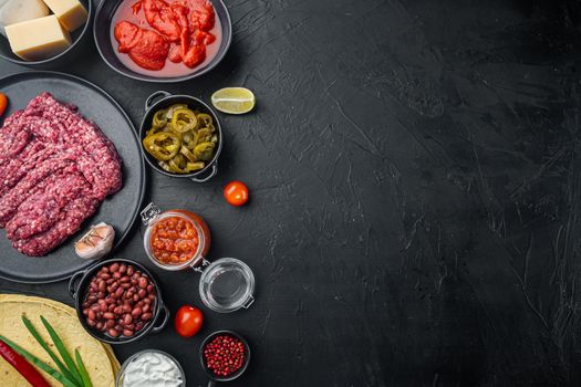 Ingredient for cooking quesadillas, on black background, top view flat lay with copy space for text