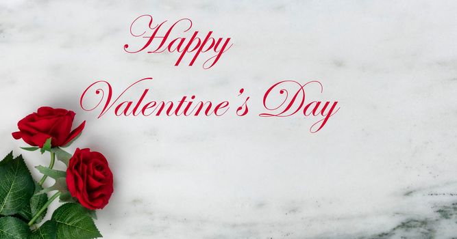 Happy Valentines Day with lovely red rose flowers on natural marble stone background plus added holiday text message