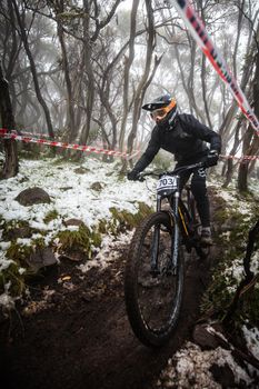 Mt Buller, Australia - January 16 2021: Practice round for the Victorian Downhill Mountain Bike Series after a summer snow storm