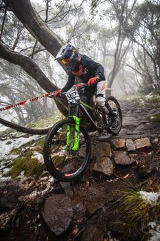 Mt Buller, Australia - January 16 2021: Practice round for the Victorian Downhill Mountain Bike Series after a summer snow storm