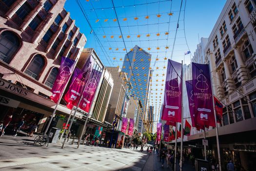 Melbourne, Australia - December 18, 2020: Busy Bourke St Mall with Christmas decorations and festivities in Melbourne, Victoria, Australia