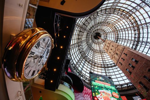 Melbourne, Australia - December 18, 2020: Busy Melbourne Central and Shot Tower with Christmas decorations and festivities in Melbourne, Victoria, Australia