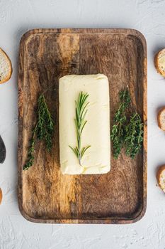 Fresh butter package, on white background, top view flat lay